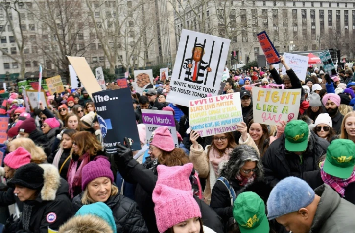 Des manifestants à la "Marche des femmes", le 19 janvier 2019 à New York
