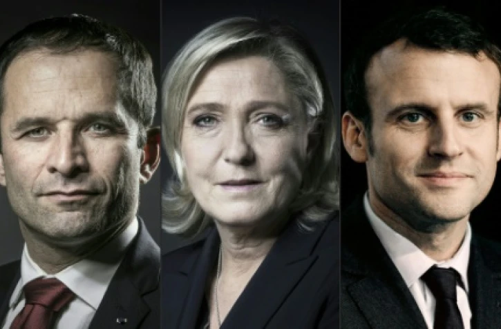 Montage en date du 21 février 2017 de portraits d'archives de François Fillon, Benoît Hamon, Marine Le Pen, Emmanuel Macron et Jean-Luc Mélenchon