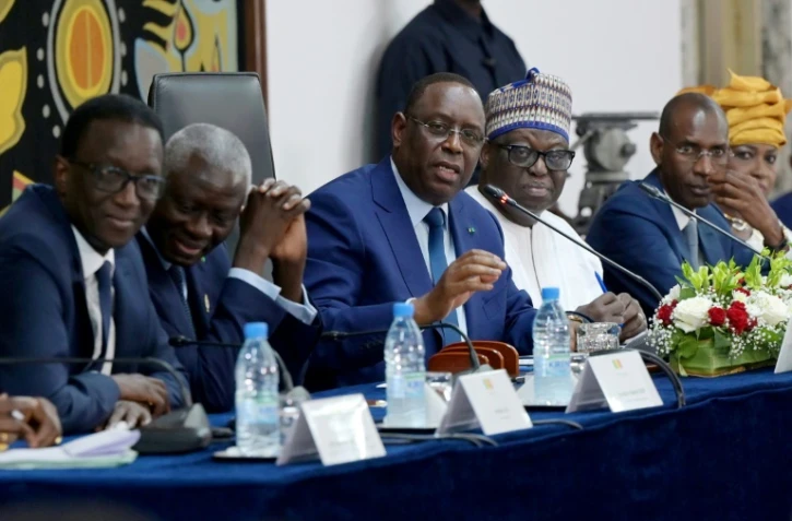 Le président sénégalais Macky Sall (c), au palais présidentiel à Dakar, le 31 mai 2023