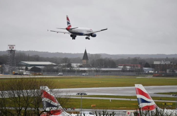 Un avion de British Airway atterrit l'aéroport de Gatwick à Londres, le 21 décembre 2018