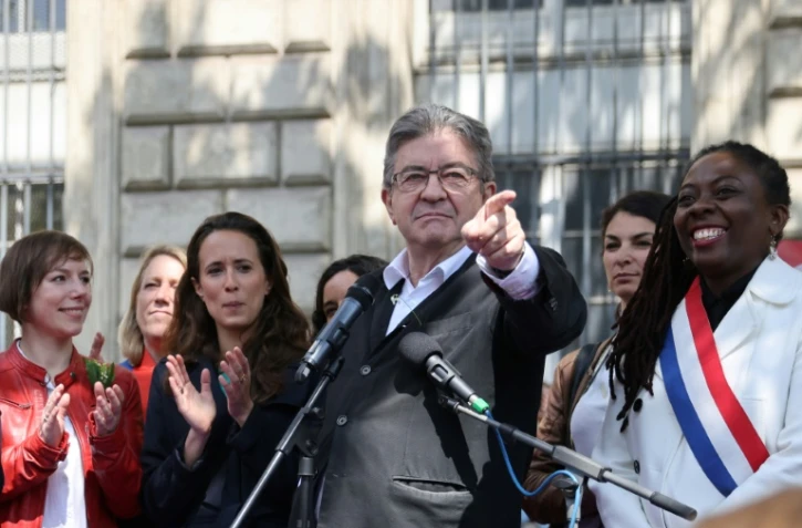 L'Insoumis Jean-Luc Mélenchon s'exprime lors de la manifestation du 1er mai à Paris 