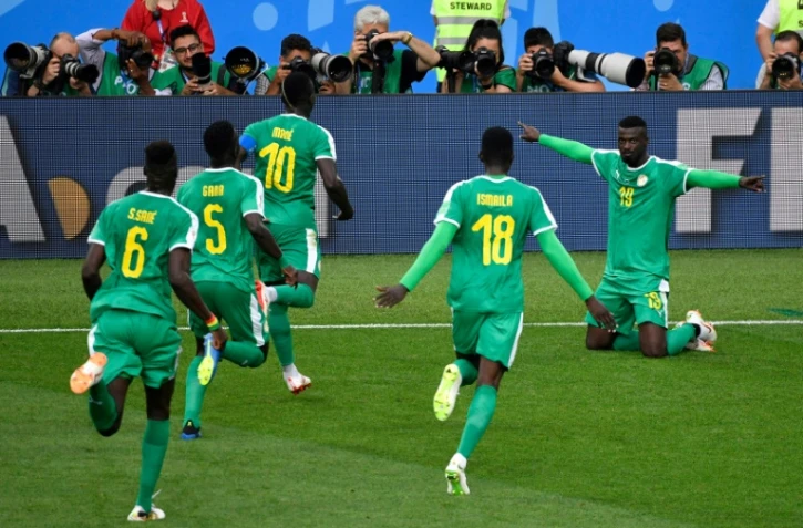 La joie des Sénégalais après le but de Mbaye Niang (d) face à la Pologne lors du Mondial, le 19 juin 2018 à Moscou
