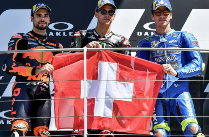 Le Français Fabio Quartararo entouré du Portugais Miguel Oliveira (gauche) et de l'Espagnol Joan Mir à Mugello le 30 mai 2021