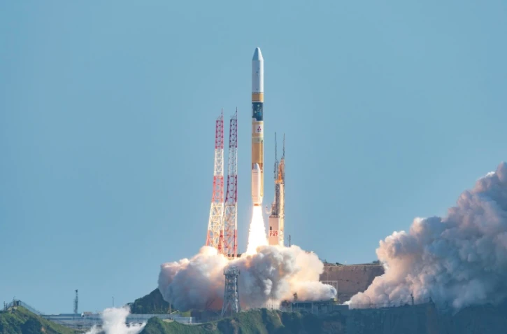 Sur cette photo de l'agence spatiale japonaise JAXA, une fusée H-IIA décolle avec à bord un module spatial devant tenter de se poser sur la Lune, le 7 septembre 2023 au centre spatial de Tanegashima