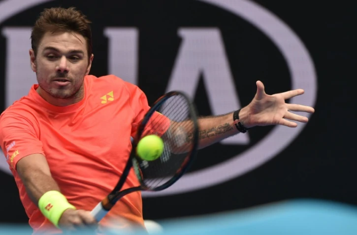 Le Suisse Stanislas Wawrinka face au Canadien Milos Raonic en 8e de finale à l'Open d'Australie, le 25 janvier 2016 à Melbourne 