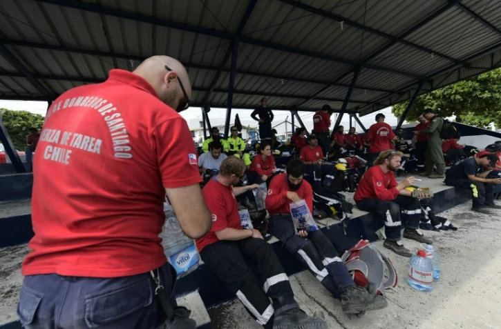 Des secouristes chiliens à Manta, en Equateur, de retour d'une opération de sauvetage, le 24 avril 2016