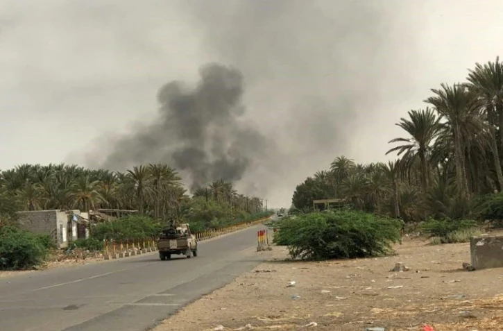 Des forces progouvernementales yéménites lors de combats contre les rebelles Houthis dans la région de Hodeida, au Yémen, le 19 juin 2018