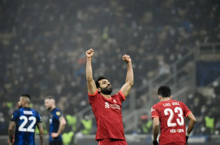 La joie de l'attaquant égyptien de Liverpool Mohamed Salah, après avoir marqué le 2e but contre l'Inter Milan, lors du 8e de finale aller de la Ligue des Champions, le 16 février 2022 au Stade San Siro