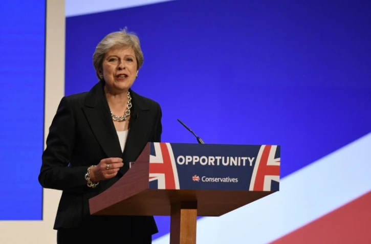 La Première ministre britannique Theresa May prononce un discours en clôture du congrès des Tories, le 3 octobre 2018 à Birmingham 