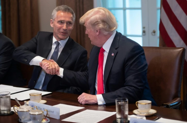 Le secrétaire général de l'Otan Jens Stoltenberg et le président américain Donald Trump à Washington, le 17 mai 2018