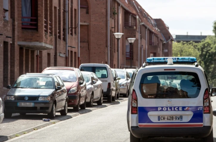 Une voiture de police dans les rues de Roubaix, en août 2014