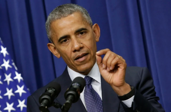 Barack Obama pauses à la Maison blanche à Washington le 22 juillet 2016. A Philadelphie, le président américain devrait souligner combien son ancienne secrétaire d'Etat a "l'intelligence, la capacité de jugement et la solidité pour lui succéder