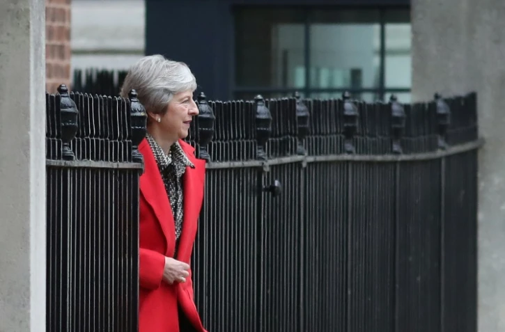 Theresa May, la Première Ministre britannique, quitte le 10, Downing Street à Londres, le 16 novembre 2018