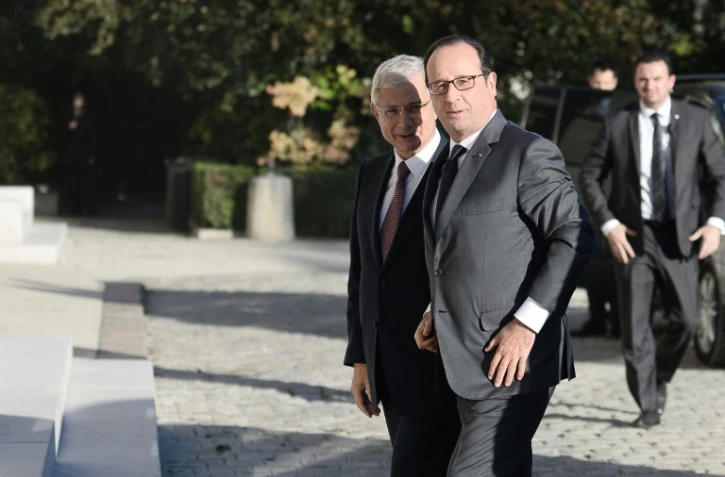 Claude Bartolone et François Hollande à leur arrivée à l'Hôtel de Lassay le 6 octobre 2016 à Paris