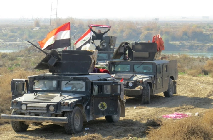 Les forces irakiennes le 22 décembre 2015 dans la région d'al-Aramil près de Ramadi 