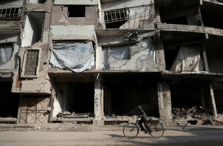 Ruines à Douma, ville sous contrôle des rebelles près de Damas, en Syrie, le 30 décembre 2016