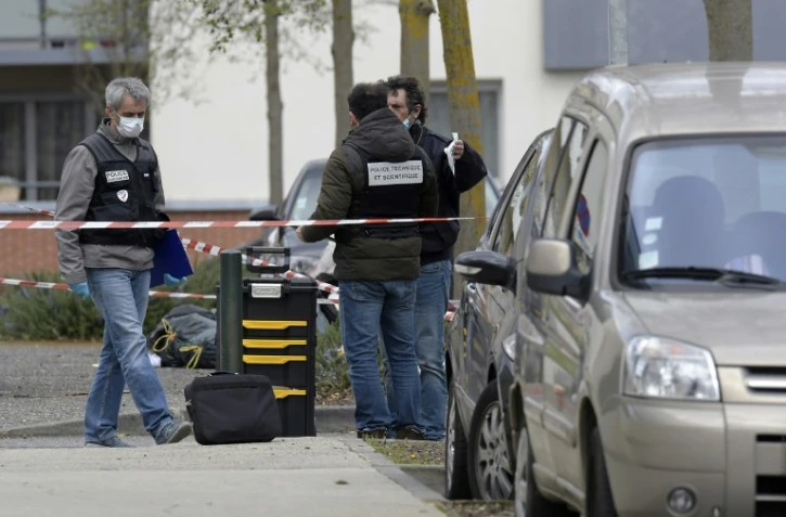 Des policiers travaillent sur le site où ont été agressés Rahim Namazov et son épouse, qui est décédée, le 30 mars 2018 à Colomiers
