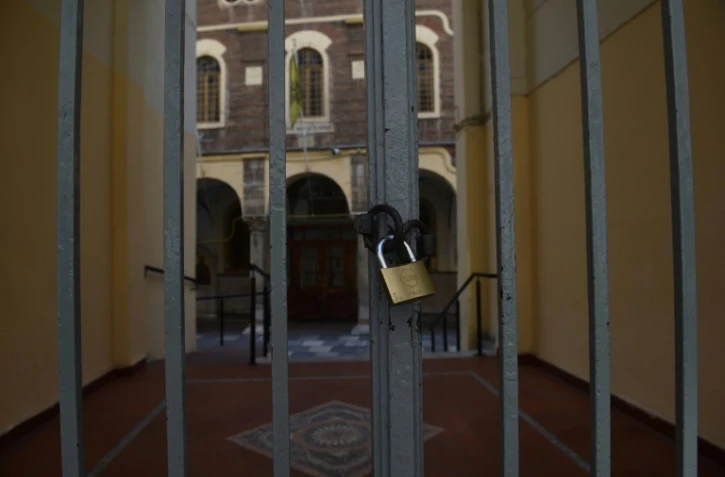 Les grilles fermées d'une église à Thessalonique , le 22 mars 2020 