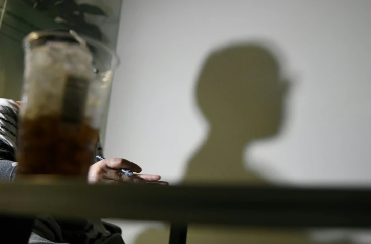 Une femme sud-coréenne, qui souhaite rester anonyme pour sa sécurité personnelle, le 31 mai 2018 à Seoul
