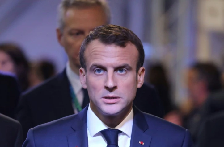 La prise de parole d'Emmanuel Macron, photographié ici le 1er décembre au G20 de Buenos Aires devant son ministre de l'Economie Bruno Le Maire, est très attendue