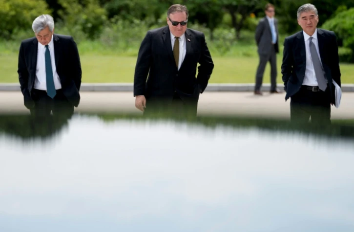 Le secrétaire d'Etat américain Mike Pompeo (centre) lors de sa visite à Pyongyang, le 7 juillet 2018