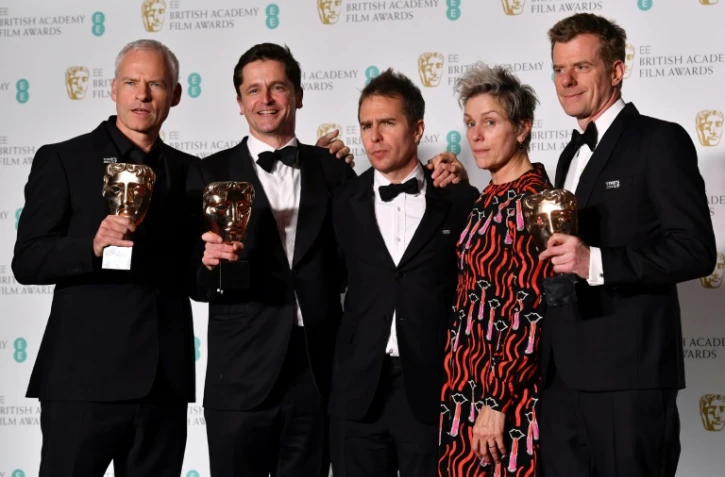 L'équipe du film "Three Billboards: les panneaux de la vengeance" le 18 février 2018 lors de la cérémonie des BAFTA: le réalisateur Martin McDonagh, le producteur Peter Czernin, l'acteur Sam Rockwell, l'actrice Frances McDormand et le producteur Graham Broadbent.