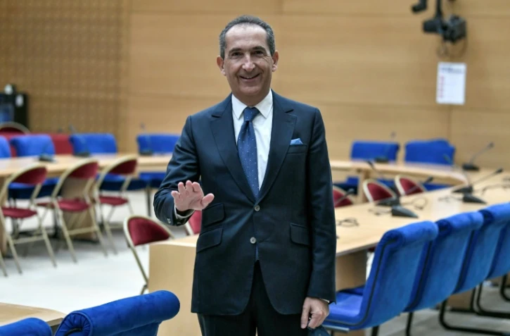 Le président d'Altice, Patrick Drahi, arrive pour une audition devant une commission parlementaire sur la concentration des médias au Sénat, à Paris le 2 février 2022