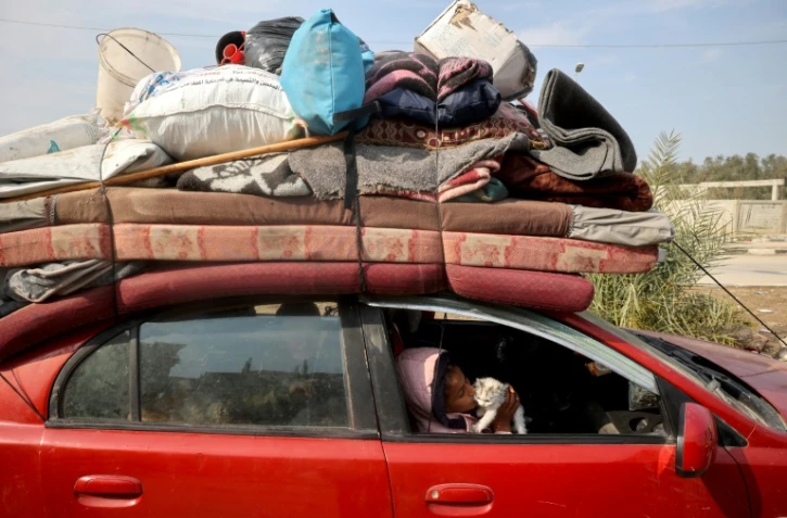 Des déplacés palestiniens rentrent dans le nord de la bande de Gaza, le 28 janvier 2025