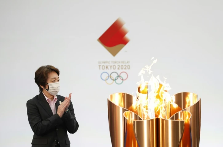 La présidente de Tokyo-2020 Seiko Hashimoto lors de la cérémonie pour le lancement du relais de la flamme olympique à Naraha (Japon) le 25 mars 2021