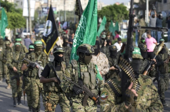 Des membres des brigades Ezzedine al-Qassam, le bras armé du Hamas, défilent à Gaza le 25 juillet 2017
