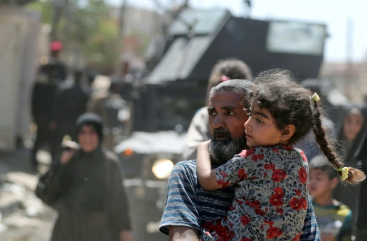 Des Irakiens quittent Mossoul, le 3 juin 2017 