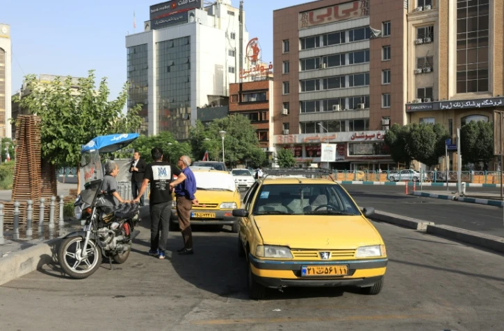 Des chauffeurs de taxi désoeuvrés à Téhéran le 23 juin 2025

