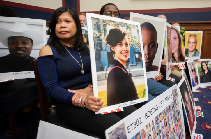 Des familles de victimes du crash du Boeing 737 Max d'Ethiopian Airlines, lors de l'audition du président de la FAA devant le Congrès à Washington, le 11 décembre 2019.