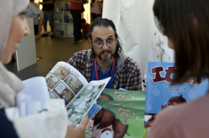 L'artiste algérien Toudji Samir (Togui) au festival international de la BD à Alger, le 6 octobre 2017