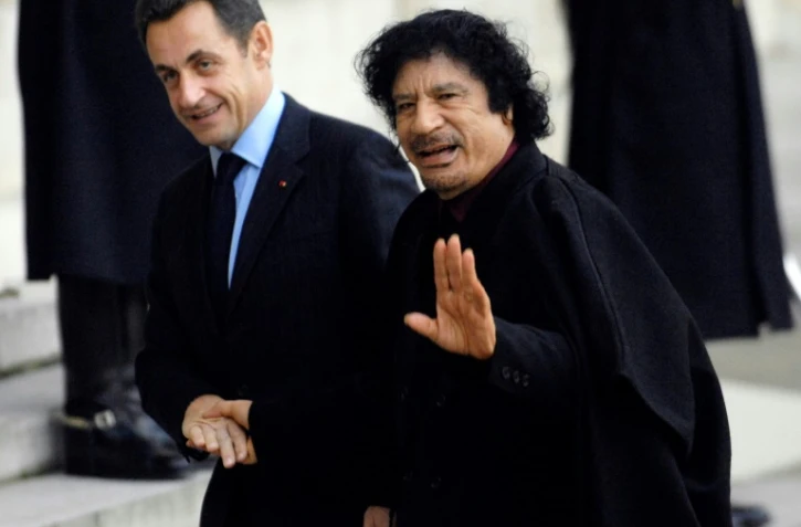Nicolas Sarkozy et Mouammar Kadhafi, le 12 décembre 2007 à l'Elysee, à Paris 