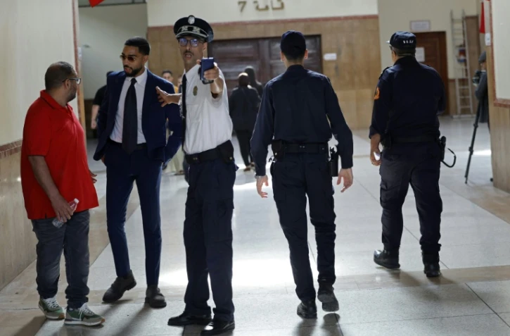 Des membres des forces de sécurité à la Cour d'appel de Casablanca pendant le procès de l'"Escobar du Sahara", le 25 juin 2026