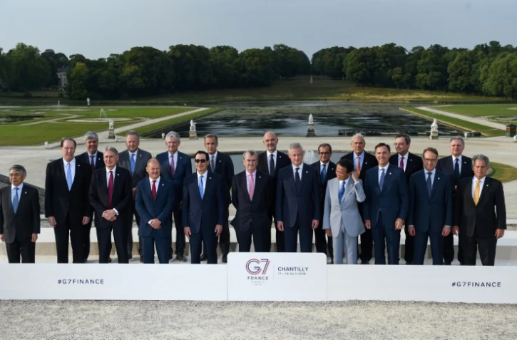 Photo de groupe pour les participants au G7 Finances de Chantilly, dans l'Oise, le 17 juillet 2019
