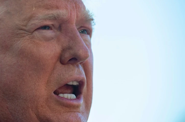 Le président américain Donald Trump répond aux questions des journalistes depuis les jardins de la Maison Blanche le 30 mai 2019