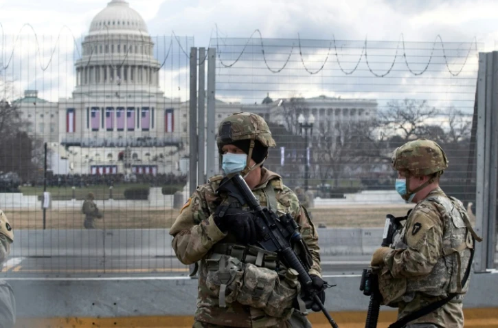 Des troupes de la Garde nationale américaine devant le Capitole de Washington, le 20 janvier 2021