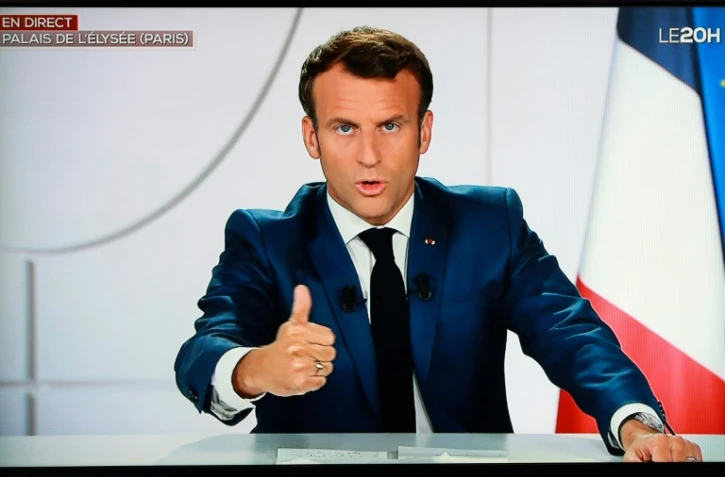 Emmanuel Macron depuis l'Elysée lors d'une interview télévisée de TF1, à Paris le 21 juillet 2020