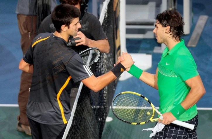 Le Serbe Novak Djokovic et l'Espagnol Rafael Nadal après une demi-finale du tournoi de Paris-Bercy remportée par le premier, le 14 novembre 2009