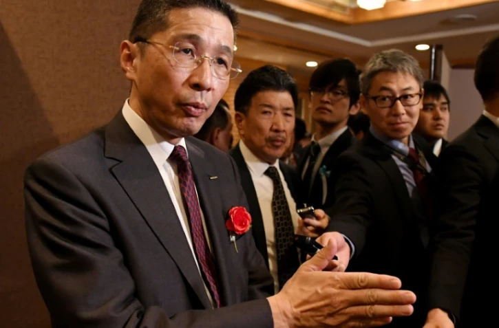 Hiroto Saikawa (g) patron de Nissan pendant un entretien avec l'Agence France-Presse en marge d'un événement de la fédération patronale Keidanren à Tokyo le 7 janvier 2019.