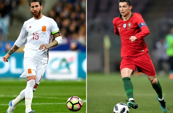 Combophoto datant du 14 juin 2018, représentant les capitaines du Portugal, Cristiano Ronaldo (d), et de l'Espagne, Sergio Ramos