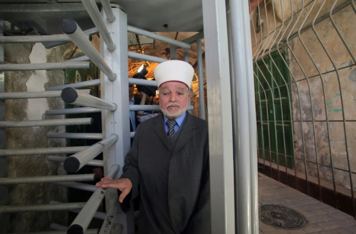 Photographie d'archive prise le 25 mars 2013, montrant le mufti de Jérusalem Mohammed Hussein à Hébron, en Cisjordanie occupée