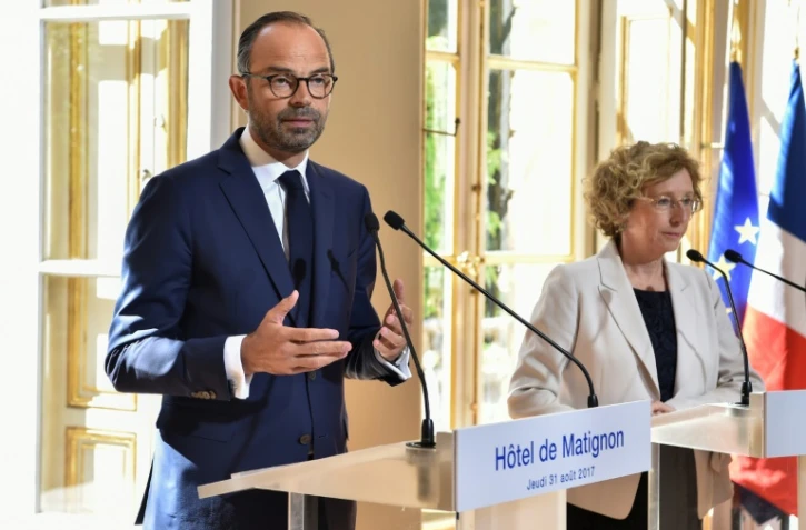 Le Premier ministre Edouard Philippe et la ministre du Travail Muriel Pénicaud, lors d'une conférence de presse sur la réforme du droit du travail, le 31 août 2017 à l'hôtel Matignon, à Paris