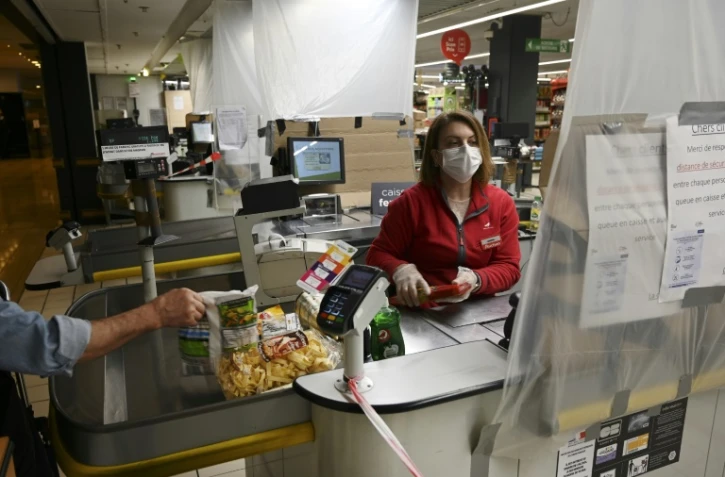 Une caissière dans un supermarché à Strasbourg, le 19 mars 2020