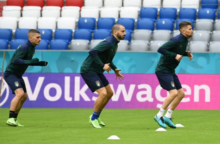Les footballeurs italiens Marco Verratti, Leonardo Bonucci et Jorginho lors d'une séance d'entraînement au stade Allianz Arena de Munich (Allemagne) le 1 er juillet 2021