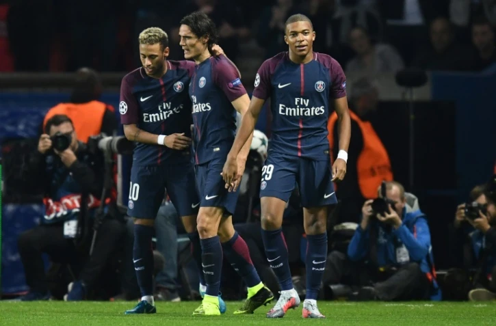 Le trio du PSG Neymar, Edinson Cavani et Kylian Mbappé, après un but face au Bayern Munich, le 27 septembre 2017 au Parc des Princes