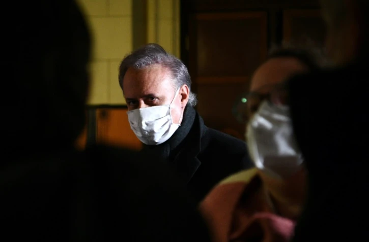 L'ex-secrétaire d'Etat Georges Tron arrive au palais de justice le 17 février 2021 à Paris