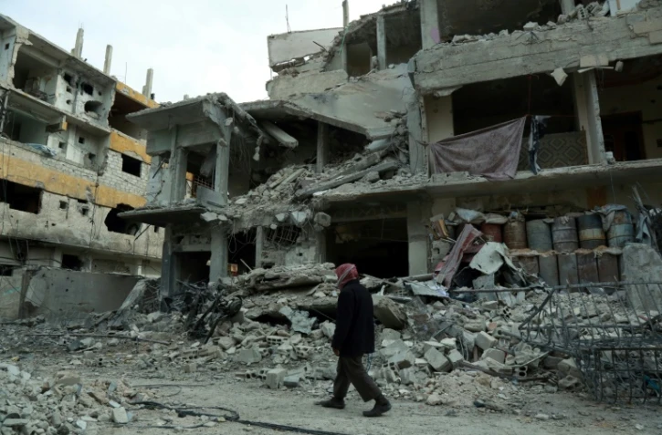 Des immeubles détruits par les bombardements du régime syrien à Douma, dans la Ghouta orientale, le 25 février 2018